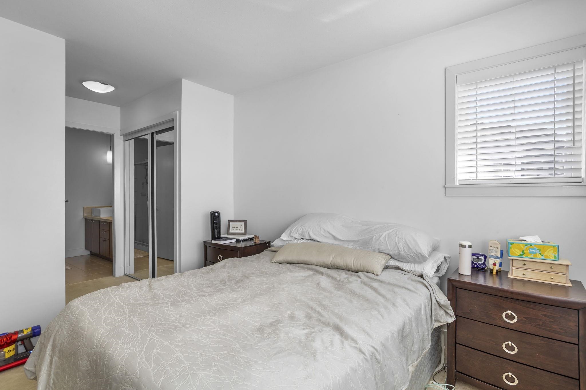 Primary bedroom with ensuite in Grandview Heights townhouse