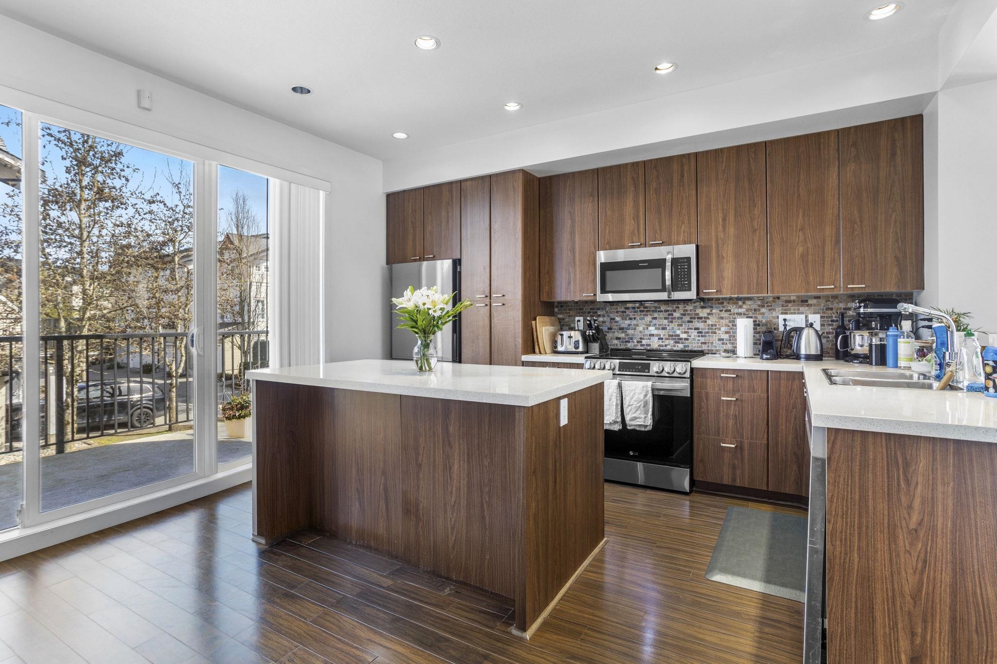 Modern open concept kitchen in 4 bed South Surrey townhouse